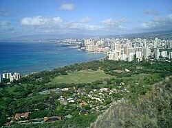 Aerial view of Kapiolani Park's open lawns at the foot of Diamond Head.
