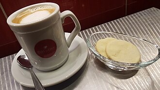 A handcrafted espresso pour in the style of a Starbucks Reserve specialty drink.